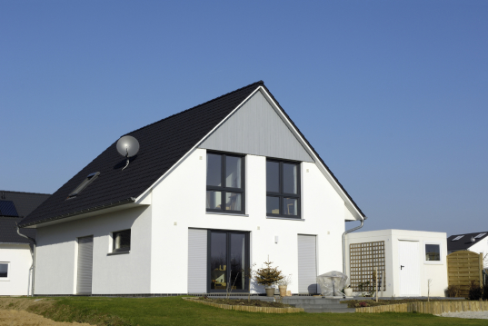 Symbolbild Einfamilienhaus mit Garten